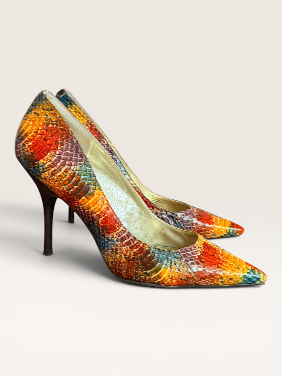 BCBGeneration Multicolor Snakeskin Pumps